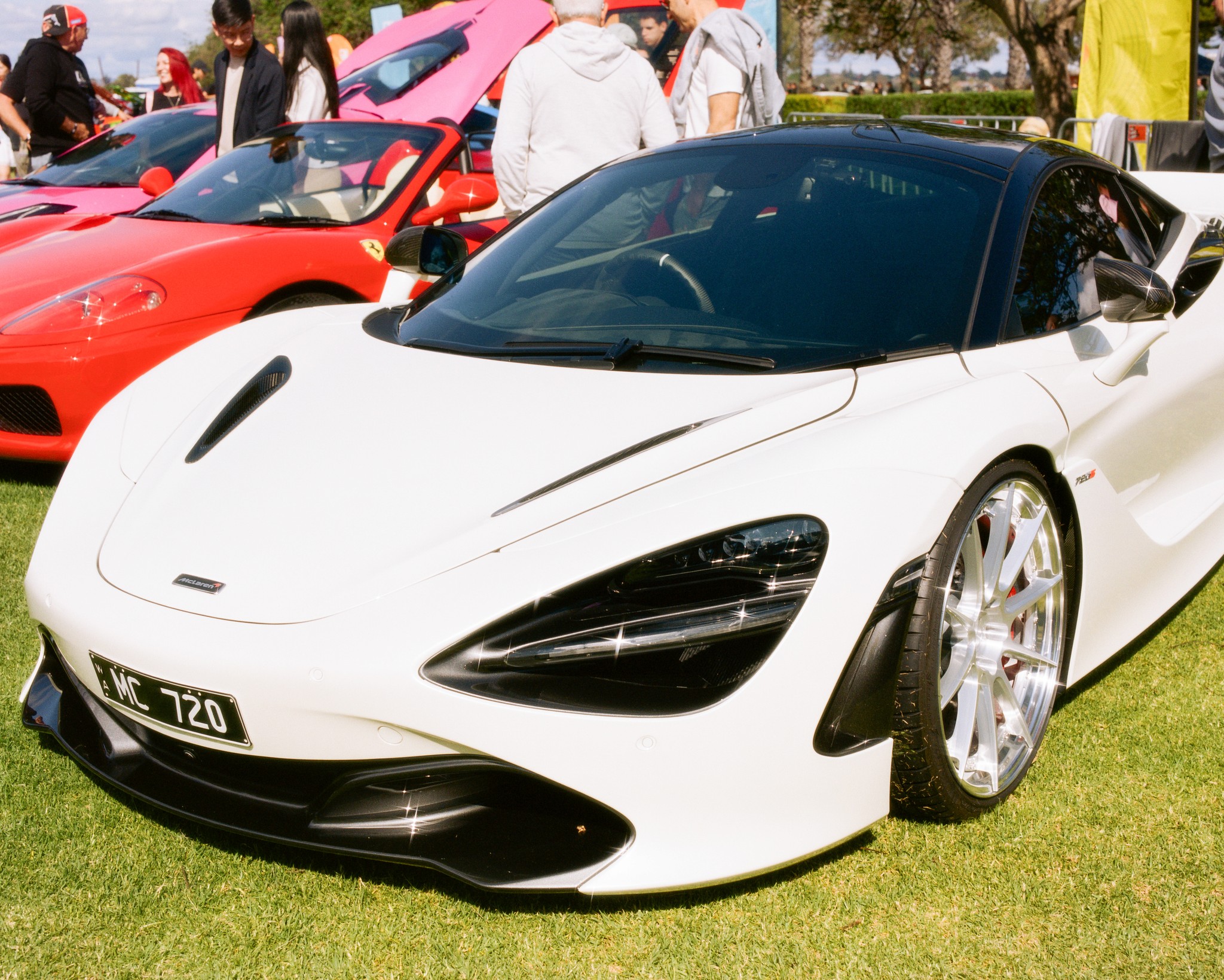 Closer view of the white McLaren 720S.