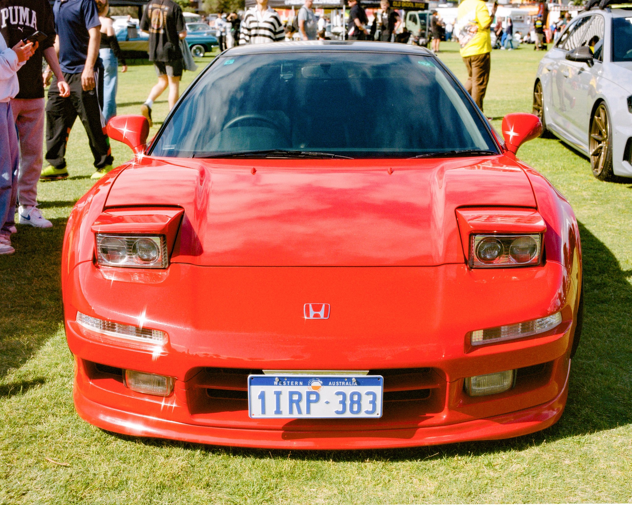 Head-on view of a red Honda NSX.